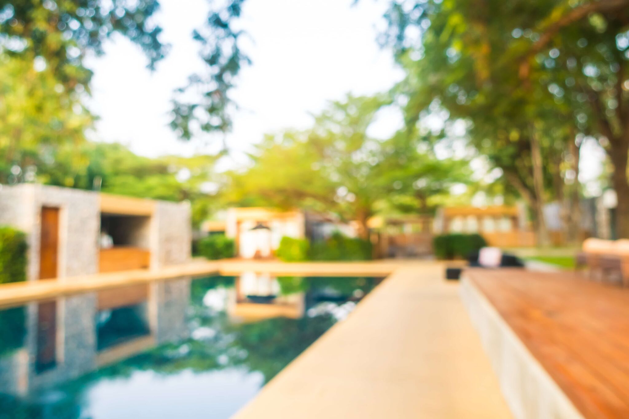 abstract blur defocused swimming pool in luxury hotel resort