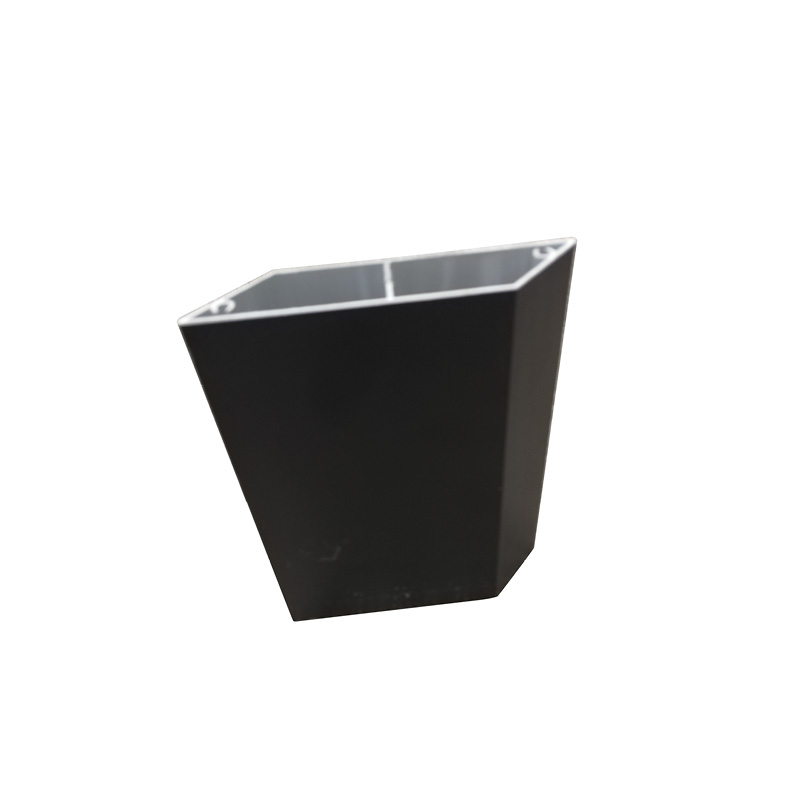 Objet en métal noir, forme hexagonale.