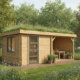 Cabane en bois avec toit végétalisé dans un jardin